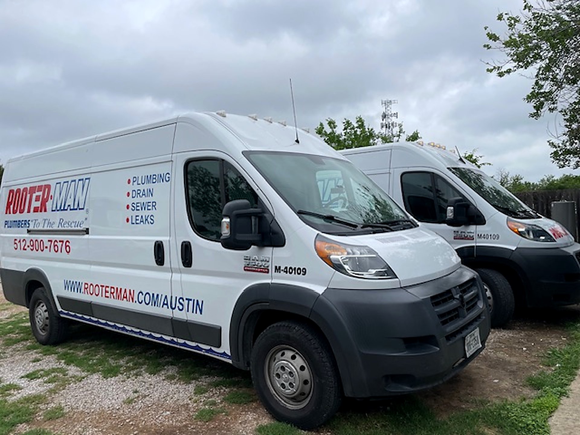 Rooter-Man of Austin service vans ready to roll